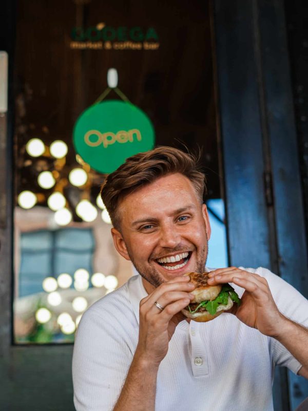 David Kerr, co-owner of a local coffee shop, Godega Market, in Omaha, Nebraska enjoying lunch.